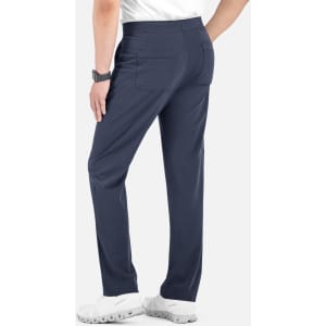 A pair of navy cargo pants with a half elastic waistband, featuring back pockets and worn with white shoes.