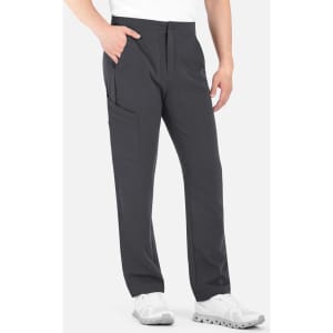 A man wearing dark grey cargo pants with a half elastic waistband, featuring multiple pockets and a logo.