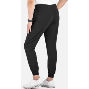 Black joggers with a full elastic waistband and tapered legs, featuring pockets and a logo.