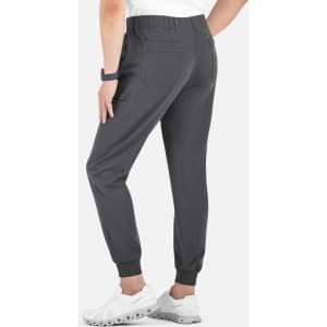 A pair of grey joggers featuring a full elastic waistband and cuffed ankles, displayed from the back.