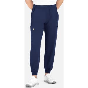 A pair of navy joggers with a full elastic waistband and side pockets, featuring a small logo.
