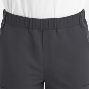 A pair of grey joggers featuring a full elastic waistband and pockets, with a visible logo.