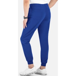 A pair of blue joggers with a full elastic waistband and cuffed ankles, featuring back pockets and a logo.
