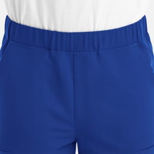 A pair of blue joggers featuring a full elastic waistband, with side pockets and a simple design.