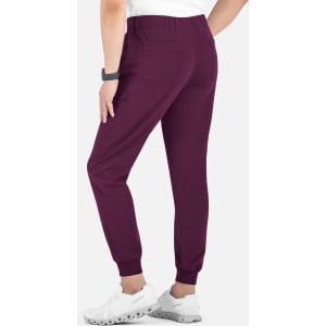 A pair of men's joggers in a rich maroon colour with a full elastic waistband and tapered legs. Features a back pocket.
