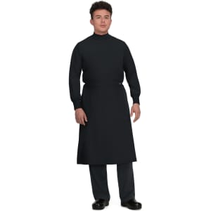 A clinical cover gown in black, featuring long sleeves and a high neckline, worn by a model standing upright.
