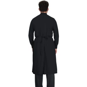 A black clinical cover gown with long sleeves and a tie at the waist, viewed from the back.