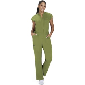 A model wearing a green Anja Jumpsuit features a zippered front and pockets, styled with a casual look.