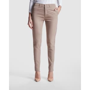 Beige women's chino trousers featuring a fitted design and front pockets, paired with a sleek top.