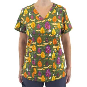 A women's V-neck top featuring a green fabric with multicoloured trees and forest animals. Includes a logo on the design.