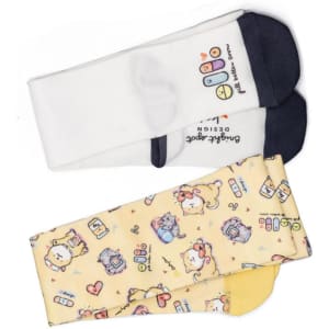A pair of sublimation socks in white and yellow, featuring playful designs and a logo on one sock.