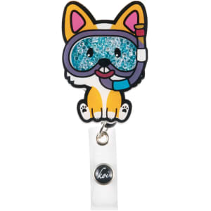 A colourful snorkelling corgi badge featuring sparkly blue elements and a white clip, with a logo on the base.