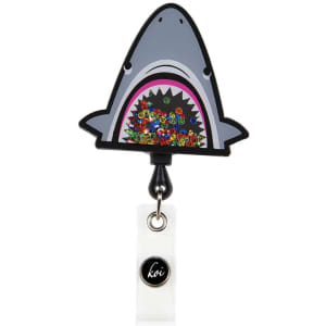 A shark-shaped badge reel featuring colourful sequins inside and a black and white lanyard attachment.