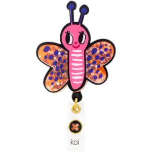 A colourful butterfly badge featuring pink and orange, with glittery wings and a small branding logo.