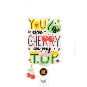 A coconut drink shaker badge in vibrant colours featuring cherry illustrations and playful text.