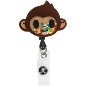 A whimsical brown monkey badge featuring colourful sprinkles, attached to a clear clip with a logo.