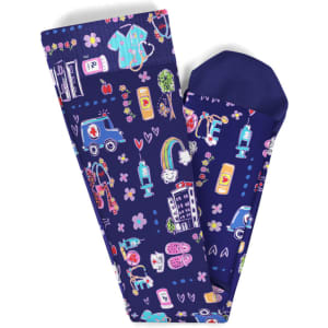 A pair of compression socks in navy blue with various colourful patterns, including medical and playful motifs.