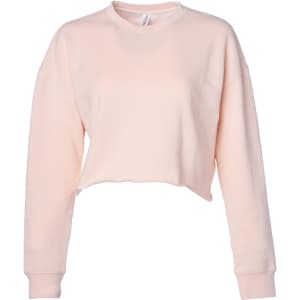 A women's crop crew in a soft pink colour with long sleeves and a relaxed fit. It features a simple design and a logo.