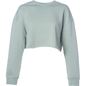 A women's cropped crew in a pale blue colour, featuring long sleeves and a relaxed fit. It has a logo.