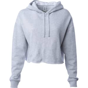 A women's crop hoodie in light grey with a hood and drawstring. Features long sleeves and a relaxed fit.