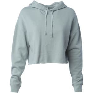 A light blue women's crop hoodie featuring a drawstring and a relaxed fit. It has a logo on it.