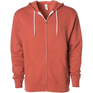 A unisex lightweight zip hood in a coral colour with a front zipper and drawstring hood. It has two side pockets and a logo.