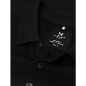 A black polo shirt with a collar and buttons, featuring a label with sizing information.