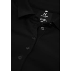 A black polo shirt with a collar and button placket, featuring a logo on the inside label.