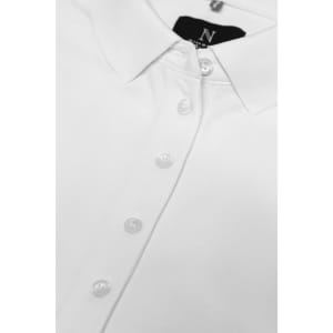 A white women's polo shirt featuring a collar and button placket, with a logo on the collar.