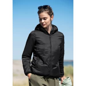 A black women's jacket with a hood, worn by a woman outdoors, against a blue sky background.