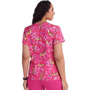 A pink floral top with a tiger print featuring short sleeves and a rounded neckline, seen from the back.