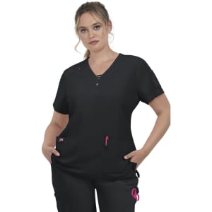 A nurse's scrub top in black with pink accents, featuring a V-neck and multiple pockets. It has a logo on one sleeve.