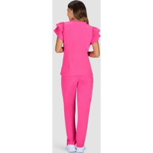 A pink outfit featuring a top with ruffled sleeves and matching trousers, set against a grey background.