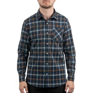 A checked shirt in navy, green, and brown tones featuring a chest pocket and a logo.