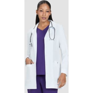 A white lab coat with a pocket, worn by a model, paired with a purple top and a stethoscope around the neck.