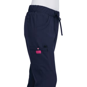 Navy blue pants with an elastic waistband, pockets, and a pink logo on the side. Features a drawstring for adjustments.