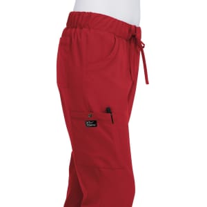 A pair of red pants featuring an elastic waistband, pockets, and a side logo.