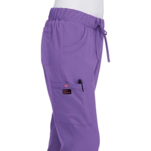 A pair of purple pants with a drawstring waistband and multiple pockets, featuring a logo.