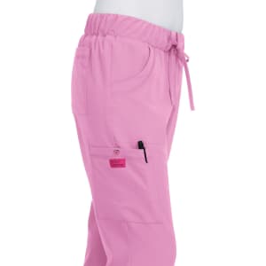 A pair of pink pants with an elastic waistband, pockets, and a logo on the side.