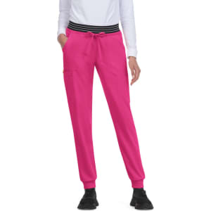 A pair of bright pink jogger pants with a black and white striped waistband and side pockets.