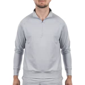 A light grey quarter-zip pullover featuring long sleeves and a collar. The garment has a logo on it.