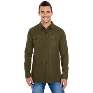 A man wearing a green long sleeve yarn-dyed flannel shirt with buttoned pockets and a collar.