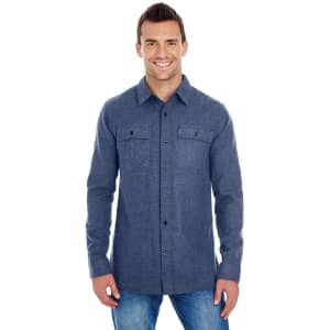 A man wearing a long sleeve, yarn-dyed flannel shirt in dark blue, featuring two chest pockets and a button-up front.