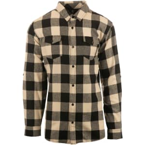 A black and white plaid flannel button-up shirt with two chest pockets and a logo on the label.