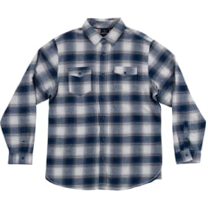 A plaid flannel shirt in blue and white, featuring long sleeves and two chest pockets, displayed on a model.