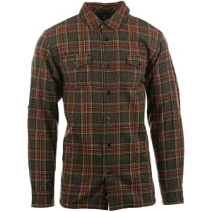 A short sleeve flannel shirt in green with red and black plaid pattern, featuring button-up front and two chest pockets.