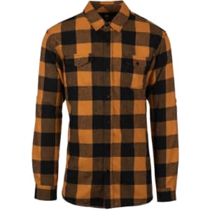A flannel shirt in orange and black plaid, featuring a button-up front and two chest pockets.