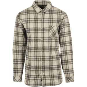 A short sleeve yarn-dyed flannel shirt in a grey and black plaid pattern with a chest pocket and button-up design.