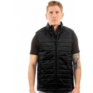 A black puffer vest with a quilted design, featuring a high collar and a front zip, worn by a model.