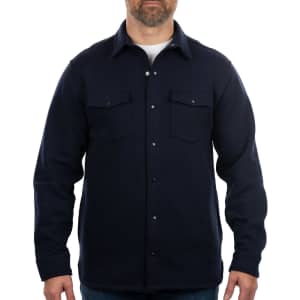 A navy fleece snap jacket with two chest pockets and a buttoned front, featuring a logo on the chest.